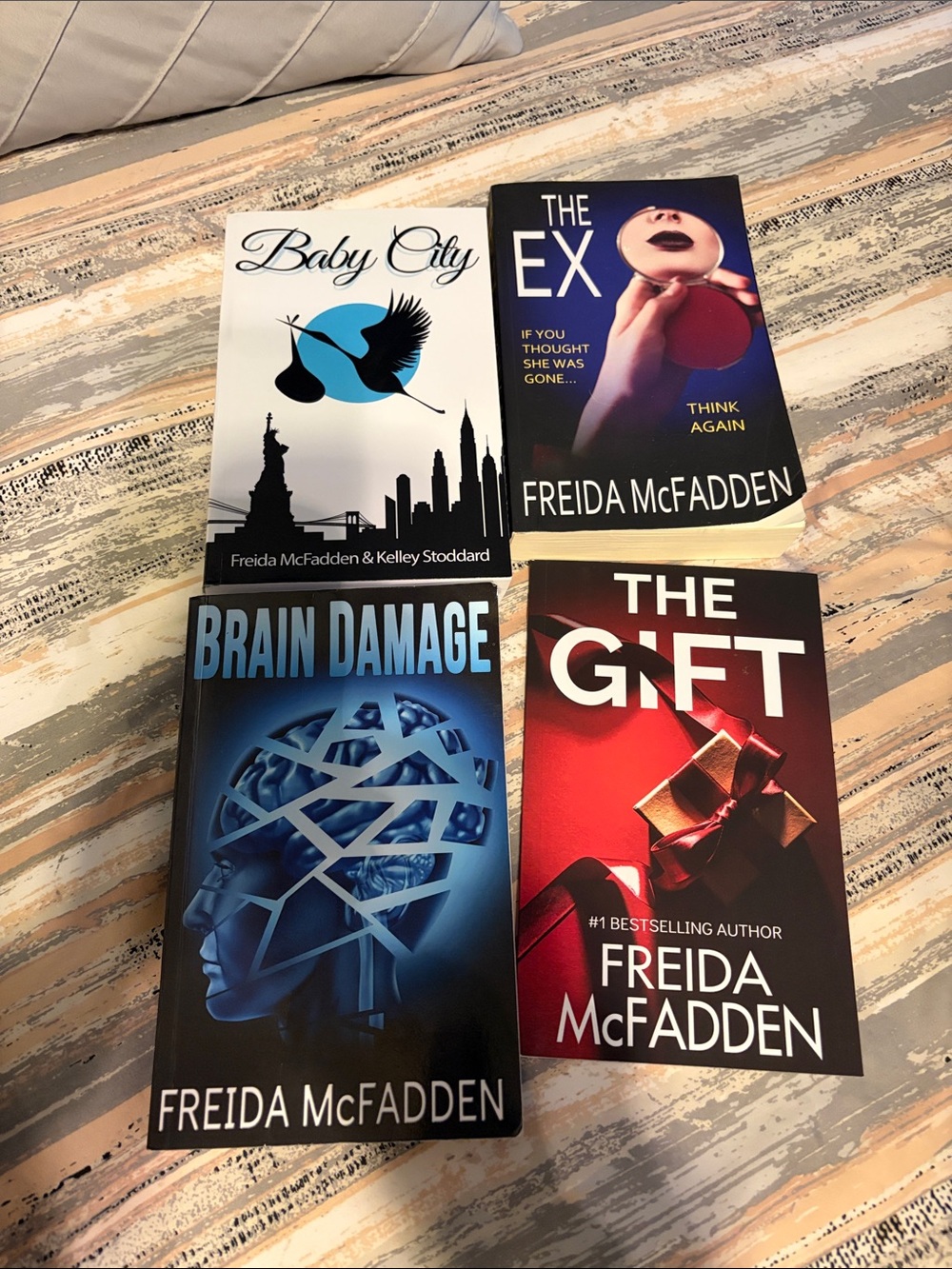 LotFreida McFadden Paperback Book Lot — Baby City, The Ex, Brain Damage,The Gift